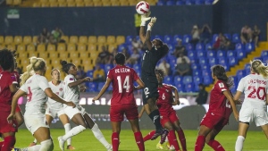 Panama's goalkeeper, Yenith Bailey, centre, catches the ball during a CONCACAF Women's Championship soccer match against Canada in Monterrey, Mexico, Friday, July 8, 2022. A complaint was filed against Canada at the 2022 CONCACAF W Championship, alleging the Canadian team had used a drone to watch a rival country's training session. THE CANADIAN PRESS/AP, Fernando Llano