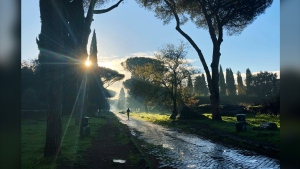 FILE - A man jogs on the ancient roman Appian Way in Rome, Friday, Dec. 11, 2020. Italy’s ancient Roman Appian Way was admitted to the UNESCO World Heritage List on Saturday, July 27 2024, becoming the country’s 60th entry on the list. (AP Photo/Gregorio Borgia, File)