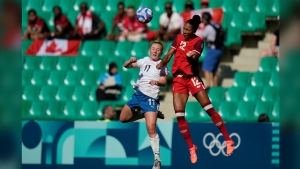 Canadian sports fans in Paris are using words like "embarrassing" and "disappointing" to describe their reactions a drone spying scandal that has rocked Canada Soccer in the early days of the Olympic Games. New Zealand's Katie Kitching, left, and Canada's Jade Rose vie for the ball during the women's Group A soccer match between Canada and New Zealand at Geoffroy-Guichard stadium during the 2024 Summer Olympics, Thursday, July 25, 2024, in Saint-Etienne, France. THE CANADIAN PRESS/AP/Silvia Izquierdo
