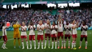 Canada team applauds fans ahead of the women's Group A soccer match between Canada and France at Geoffroy-Guichard stadium during the 2024 Summer Olympics, Sunday, July 28, 2024, in Saint-Etienne, France. (AP Photo/Silvia Izquierdo)