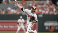 Baltimore Orioles starting pitcher Corbin Burnes delivers during the second inning of a baseball game against the Toronto Blue Jays, Tuesday, July 30, 2024, in Baltimore. (AP Photo/Stephanie Scarbrough)