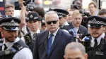 Former BBC broadcaster Huw Edwards arrives at Westminster Magistrates' Court in London, Wednesday July 31, 2024. (Jonathan Brady/PA via AP)