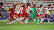 Canada players celebrate their side's 1-0 win after a women's Group A soccer match between Colombia and Canada, at the 2024 Summer Olympics, Wednesday, July 31, 2024, at the Nice Stadium in Nice, France. (AP Photo/Julio Cortez)