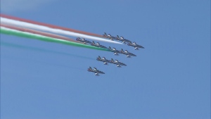 The Frecce Tricolori, the Italian air force aerobatic team, flies over Toronto on Aug. 1, 2024.