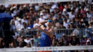 Steven van de Velde of the Netherlands competes during the beach volleyball match between the Netherlands and Italy at Eiffel Tower Stadium at the 2024 Summer Olympics in Paris, France, Sunday, July 28, 2024. (AP Photo/Louise Delmotte)