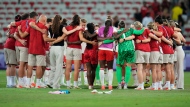 Canada players celebrate their side's 1-0 win after a women's Group A soccer match between Colombia and Canada, at the 2024 Summer Olympics, Wednesday, July 31, 2024, at the Nice Stadium in Nice, France. (AP Photo/Julio Cortez)