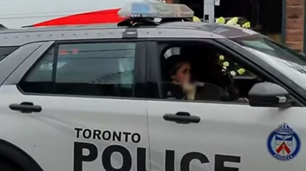 Officer giving man the middle finger