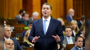 Conservative House Leader Andrew Scheer says Canadians have a right to know how a man charged with committing a terrorism offence for ISIS abroad evaded Canada's screening process to immigrate here and become a citizen. Scheer asks a question during question period in the House of Commons of Parliament Hill in Ottawa on Thursday, June 6, 2024. THE CANADIAN PRESS/Sean Kilpatrick