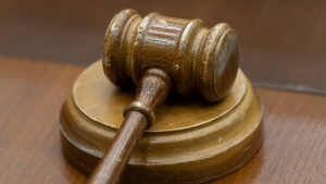 A gavel sits on a desk in this photo. (Source: THE CANADIAN PRESS/Adrian Wyld)