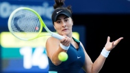 Bianca Andreescu of Canada hits a return to Lesia Tsurenko of Ukraine at the National Bank Open in Toronto on Tuesday, August 6, 2024. THE CANADIAN PRESS/Frank Gunn