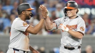 Baltimore Orioles' Jackson Holliday (right) celebrates his two-run home run against the Toronto Blue Jays with Eloy Jimenez during seventh inning MLB action in Toronto on Wednesday, Aug. 7, 2024. THE CANADIAN PRESS/Frank Gunn