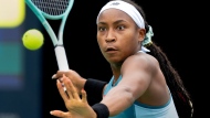 FILE - Coco Gauff of the USA hits a forehand to Yafan Yang of China at the National Bank Open in Toronto on Thursday August 8, 2024. THE CANADIAN PRESS/Frank Gunn