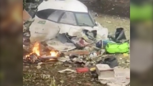 This frame grab from video shows wreckage from a plane that crashed by a home in Vinhedo, Sao Paulo state, Brazil, Friday, Aug. 9, 2024. (Felipe Magalhaes Filho via AP)