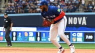 Toronto Blue Jays first baseman Vladimir Guerrero Jr. (27) fields a ground ball off the bat of Oakland Athletics centre J.J. Bleday (not shown) in the sixth inning of an MLB baseball game in Toronto on Saturday, Aug 10, 2024. THE CANADIAN PRESS/Jon Blacker