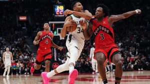 Milwaukee Bucks forward Giannis Antetokounmpo (34) drives as Toronto Raptors forward O.G. Anunoby (3) defends during first half NBA basketball action in Toronto on November 1, 2023. The Toronto Raptors will visit the Milwaukee Bucks on Nov. 12 in their opening game of the 2024 Emirates NBA Cup in-season tournament. THE CANADIAN PRESS/Nathan Denette