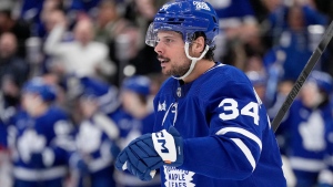 Toronto Maple Leafs centre Auston Matthews (34) celebrates his goal during second period NHL hockey action against the Detroit Red Wings, in Toronto, Saturday, April 13, 2024. THE CANADIAN PRESS/Frank Gunn