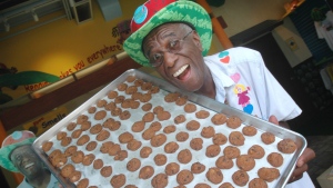 FILE - This Tuesday, June 12, 2007, file photo shows Wally Amos, of Kailua, Hawaii, in his home office in the Lanikai section of Kailua, Hawaii.  (AP Photo/Lucy Pemoni)