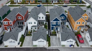 New single family houses billed as estate cottages are seen in an aerial view, in Delta, B.C., on Monday, Aug. 12, 2024. THE CANADIAN PRESS/Darryl Dyck