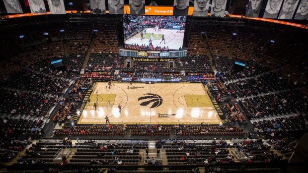 FILE - Empty seats are seen at the Scotiabank Arena as Toronto Raptors take on Golden State Warriors in NBA basketball action in Toronto on Saturday, December 18, 2021. THE CANADIAN PRESS/Chris Young