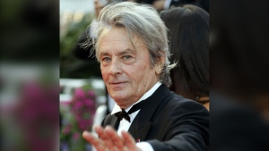 French Actor Alain Delon arrives for the screening of "Chacun Son Cinema" (To Each His Own Cinema), at the 60th International film festival in Cannes, southern France, on May 20, 2007. (AP Photo/Andrew Medichini, File)