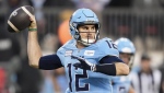 Toronto Argonauts quarterback Chad Kelly passes the ball while playing against the Montreal Alouettes during first half CFL Eastern Conference finals football action in Toronto on Saturday, November 11, 2023. THE CANADIAN PRESS/Nathan Denette