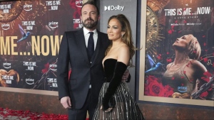 Ben Affleck, left, and Jennifer Lopez arrive at the premiere of "This Is Me... Now: A Love Story" on Feb. 13, 2024, in Los Angeles. (Photo by Jordan Strauss/Invision/AP, File)