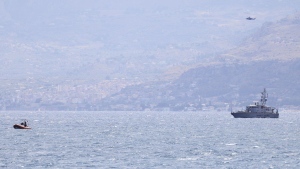 Emergency services at the scene of the search for a missing boat, in Porticello Santa Flavia, Italy, Monday, Aug. 19, 2024. (Alberto Lo Bianco /LaPresse via AP)