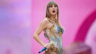 FILE - Taylor Swift performs at Wembley Stadium as part of her Eras Tour, June 21, 2024, in London. (Photo by Scott A Garfitt/Invision/AP, File)