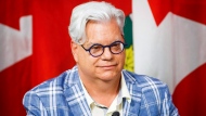 FILE - Fred Hahn, President of the Ontario Canadian Union of Public Employees (CUPE), speaks at a press conference to voice the opposition to the 