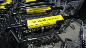 No Name logos on shopping carts are pictured at a Loblaws store in Ottawa on Aug. 21, 2024. THE CANADIAN PRESS/Sean Kilpatrick