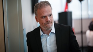 Federal Health Minister Mark Holland leaves after a news conference, in Vancouver, B.C., Tuesday, July 23, 2024. THE CANADIAN PRESS/Darryl Dyck 