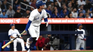 Toronto Blue Jays third baseman Ernie Clement (28) hits a two run home run against the Los Angeles Angels during first inning MLB baseball action in Toronto on Thursday, Aug 22, 2024. THE CANADIAN PRESS/Jon Blacker