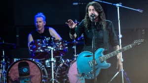 (From left) Foo Fighters drummer Josh Freese and Dave Grohl performing at the Roskilde Festival in Denmark in July. (Helle Arensbak/Ritzau Scanpix/AFP/Getty Images via CNN Newsource)