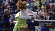 Naomi Osaka, of Japan, warms up before playing against Jelena Ostapenko, of Latvia, during the first round of the U.S. Open tennis championships, Tuesday, Aug. 27, 2024, in New York. (AP Photo/Seth Wenig)