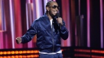 FILE - Host Ludacris speaks from the stage during the iHeartRadio Music Awards, April 1, 2024, at the Dolby Theatre in Los Angeles. (AP Photo/Chris Pizzello, File)