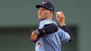 Toronto Blue Jays' Bowden Francis winds up for a pitch to a Boston Red Sox batter in the first inning of a baseball game Thursday, Aug. 29, 2024, in Boston. (AP Photo/Steven Senne)