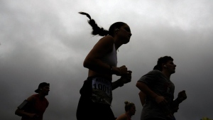 Runners compete in the Falmouth Road Race, Sunday, Aug. 18, 2024, in Falmouth, Mass. (AP Photo/Jeff Roberson)