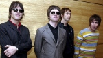 Members of British rock band Oasis pose for photos ahead of a concert in Hong Kong, Feb. 25, 2006. From left are, Gem Archer, Noel Gallagher, Andy Bell, and Liam Gallagher. (AP Photo/Lo Sai Hung)