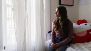 Scarlett Goddard Strahan, 11, sits for a portrait at her home on Tuesday, Aug. 20, 2024, in Sacramento, Calif. (AP Photo/Juliana Yamada)