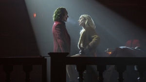 This image released by Warner Bros. Pictures shows Joaquin Phoenix, left, and Lady Gaga in a scene from "Joker: Folie à Deux." (Niko Tavernise/Warner Bros. Pictures via AP)