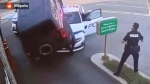 A driver in a stolen Ford Bronco attempts to escape police by driving over a cruiser at a Tim Horton's Drive-thru near Goreway and Etude drives Tuesday September 3, 2024. (Courtesy 905polis)