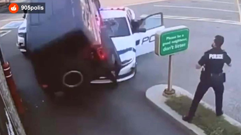 Video circulating on social media shows the large red and black Bronco sitting atop the cruiser. September 4, 2024 (CP24.com 