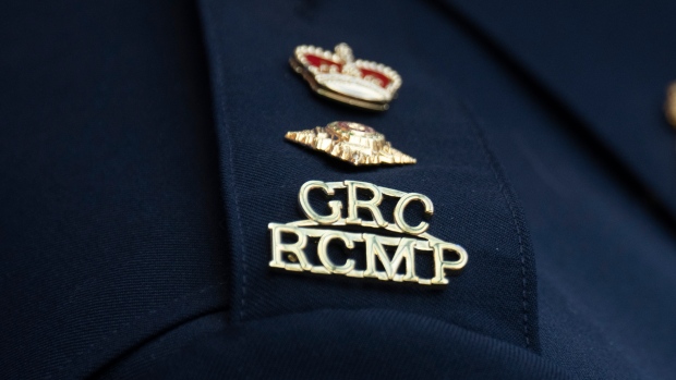 The RCMP logo is seen on the shoulder of a superintendent during a news conference, Saturday, June 24, 2023 in St. John’s, Newfoundland. THE CANADIAN PRESS/Adrian Wyld 