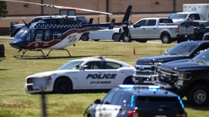 A medical helicopter is seen in front of Apalachee High School after a shooting at the school Wednesday, Sept. 4, 2024, in Winder, Ga. (AP Photo/Mike Stewart)