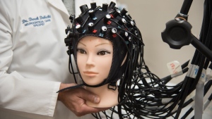 Researchers in London., Ont., are using a functional near infrared spectroscopy (fNIRS) cap -- pictured on a mannequin -- to shine light into the brains of unresponsive patients in a coma to detect signs of awareness. THE CANADIAN PRESS/HO-London Health Sciences 