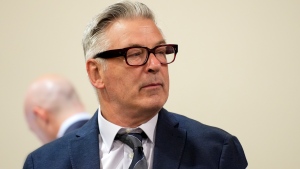 FILE - Alec Baldwin sits in court during his trial in Santa Fe, N.M., Thursday, July 11, 2024. Baldwin is facing a charge of involuntary manslaughter in the death of a cinematographer on the set of the film "Rust". (Ramsay de Give/Pool Photo via AP)