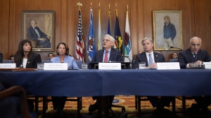 Attorney General Merrick Garland, centre, attends an Election Threats Task Force meeting in Washington on Sept. 4, 2024. (Mark Schiefelbein / AP Photo)