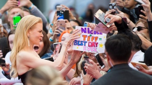 Actor Nicole Kidman signs autographs for fans on the red carpet for the gala premiere of the film "Goldfinch" in Toronto on Sunday, Sept. 8, 2019. THE CANADIAN PRESS/Nathan Denette