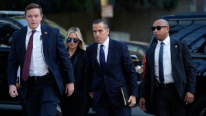 Hunter Biden, centre, and his wife Melissa Cohen Biden arrive in federal court for jury selection for his tax trial in Los Angeles on Sept. 5, 2024. (Jae C. Hong / AP Photo)