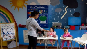 Children attend classes at a foster home of the New Hope Foundation on the outskirts of Beijing, China on Oct. 11, 2017. (AP Photo/Ng Han Guan) 